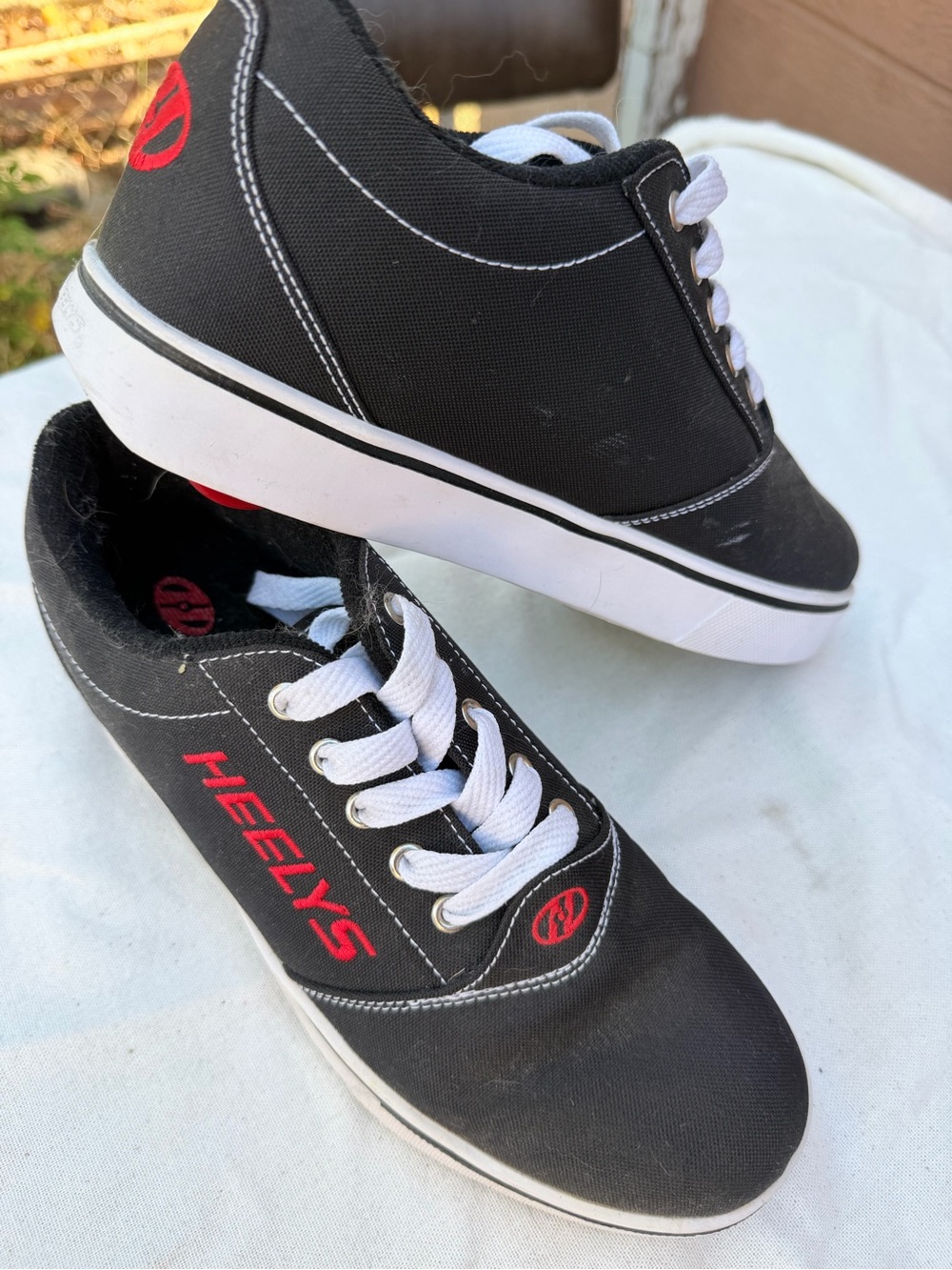 Heelys Black Canvas Sneakers with Red Logo and White Laces